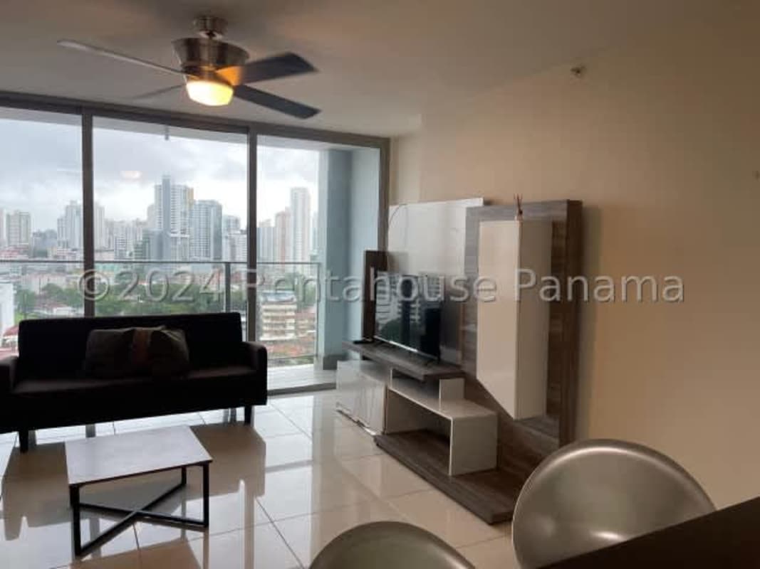 Furnished bedroom with city views and built-in closet at PH Vía España Tower Panama City