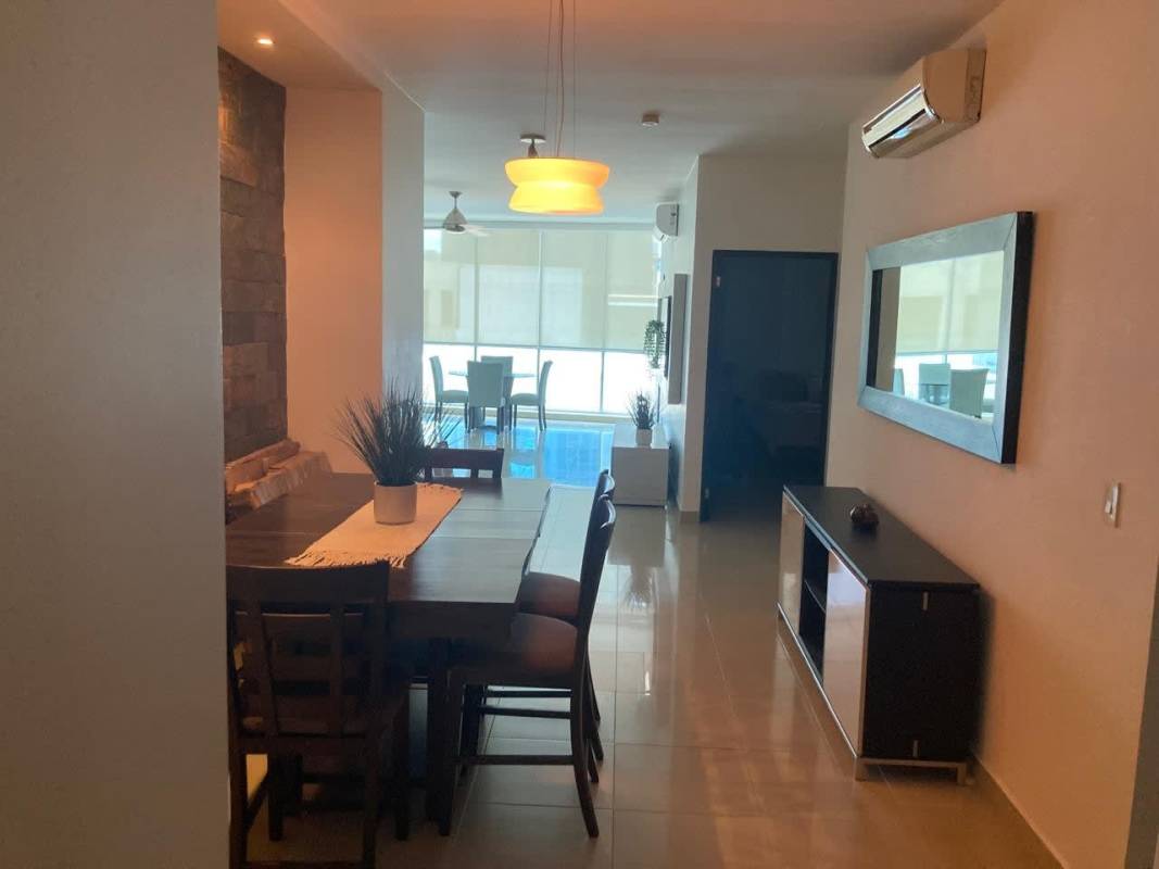 Dining area with balcony and city views apartment PH Galeria Uno Obarrio Panama City