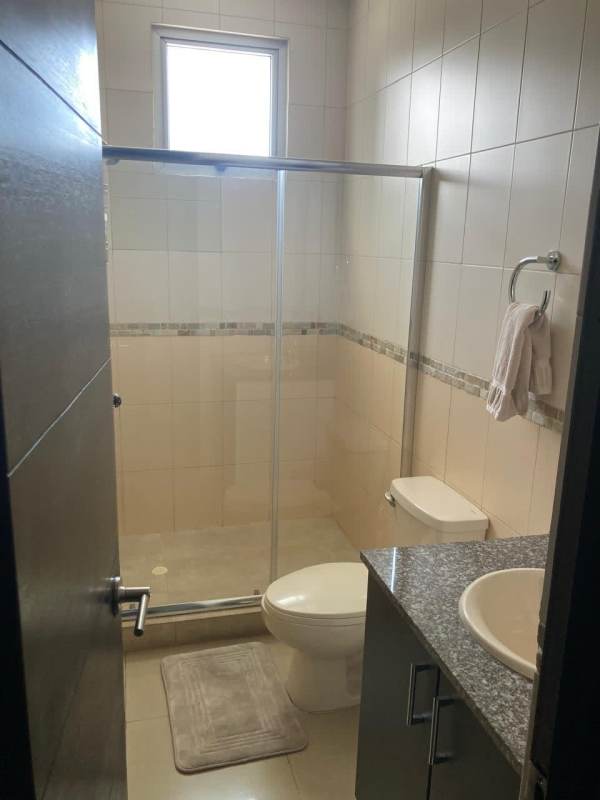 Bathroom with granite countertop vanity and glass shower PH Galeria Uno Panama