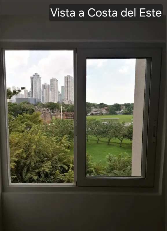 Large windows overlooking skyline and park from Panama Viejo apartment