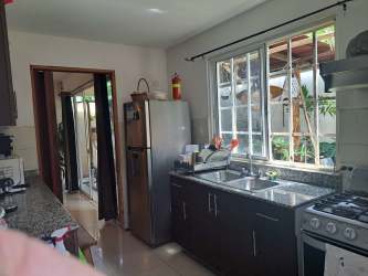 Kitchen with granite countertops, double sink, appliances for rent house Panama