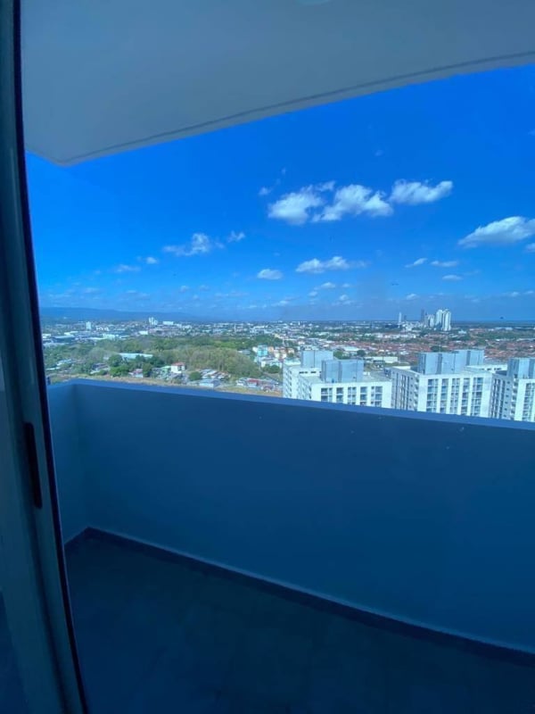 Modern lobby entrance with seating at PH La Cincuentenario Panama City