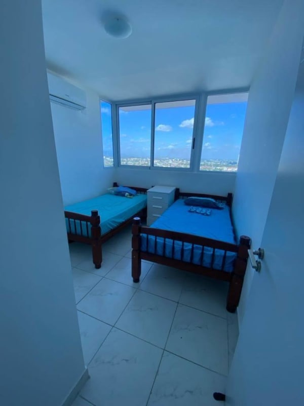 Rooftop pool and terrace with panoramic city view at PH La Cincuentenario