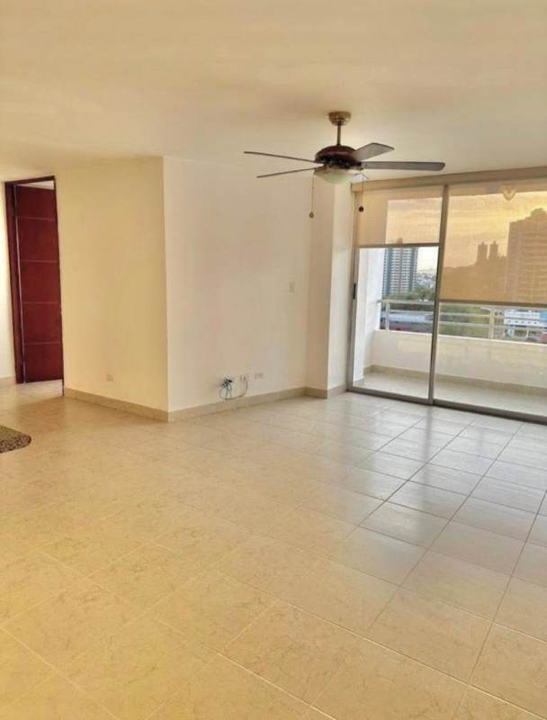 Second bedroom with tile floors, large window, ceiling fan in PH Central Park Panama