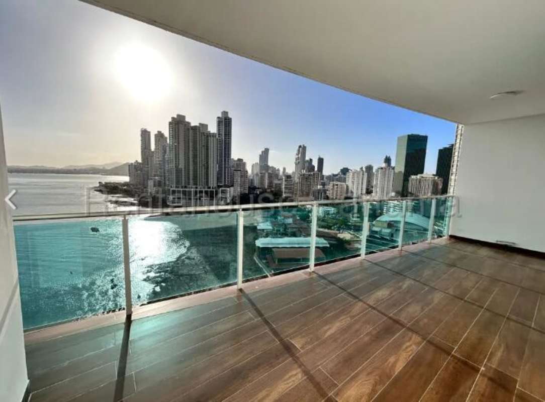 Contemporary kitchen with granite island, stainless steel appliances in PH Ocean Club luxury condo Punta Pacifica Panama