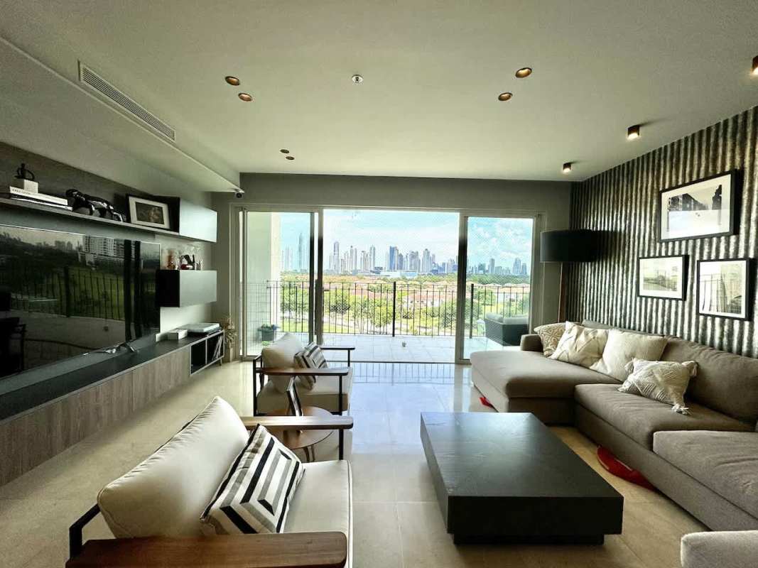 Spacious bedroom featuring marble floors, large glass windows to golf PH The Reserve Santa María Panama