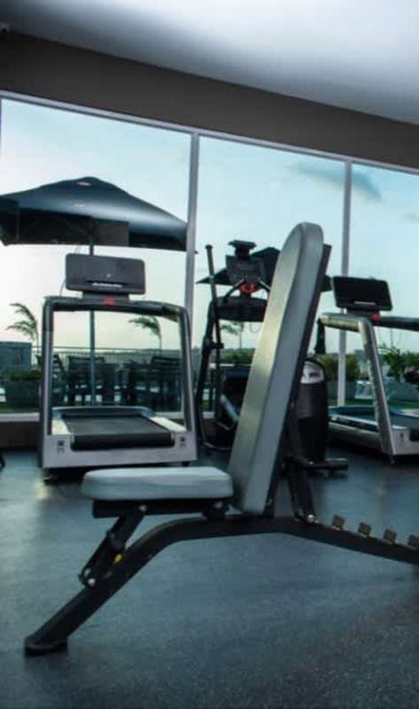 High-rise apartment building with swimming pool and city views Villa de las Fuentes Panama.