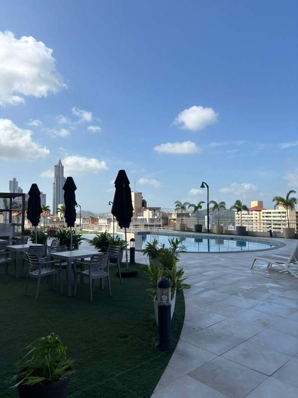 Panoramic view of Panama City skyline and hills from the apartment balcony Villa de las Fuentes.