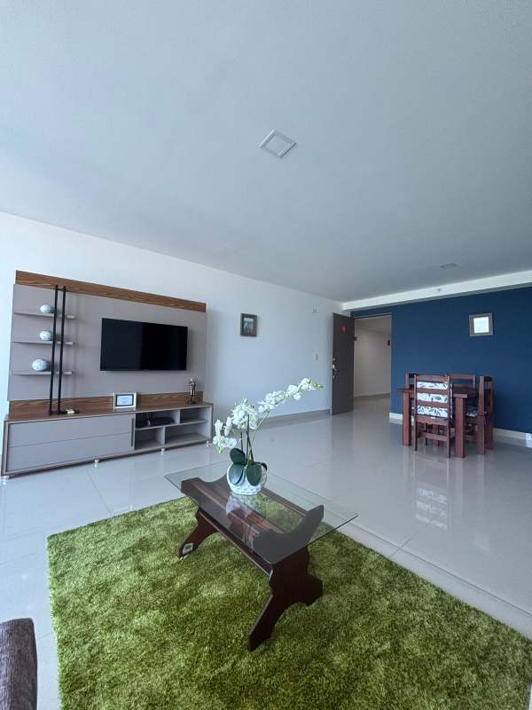Bright living dining area with ceramic floor, modern furniture, balcony access Villa de las Fuentes Panama.