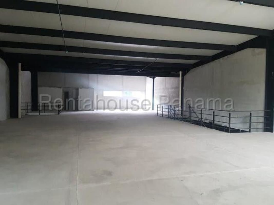 Interior staircase connecting warehouse ground floor with mezzanine office space in Ancon industrial property