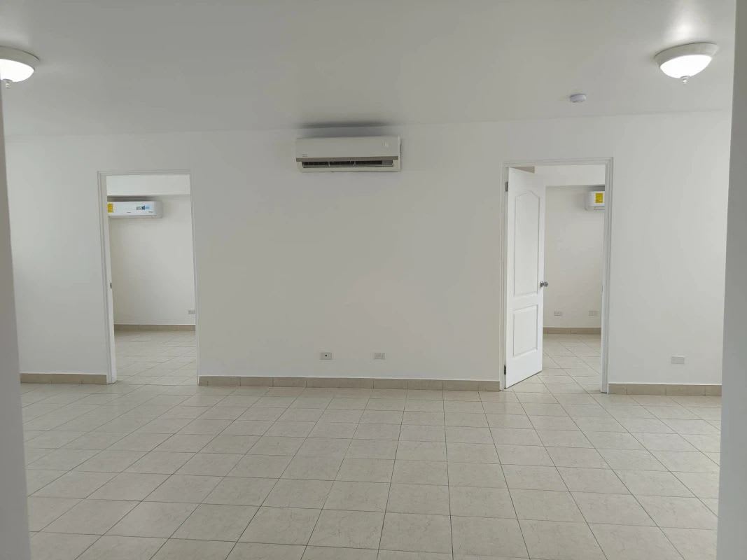 Spacious open-plan living dining room with split AC units PH Majestic Garden Panama