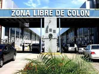 Entrance gate at Zona Libre Free Trade Zone Colón with parking area