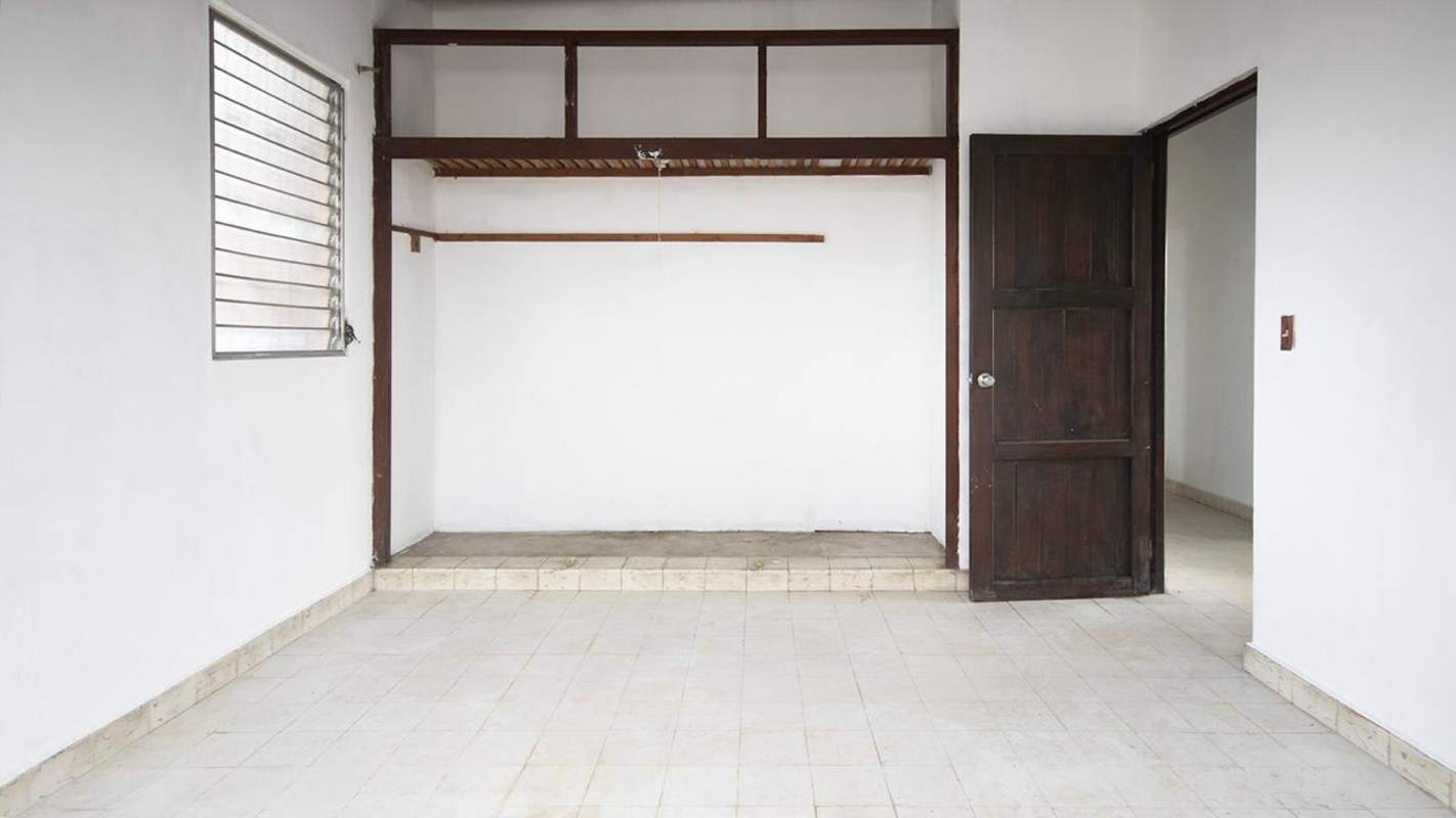 Spacious bedroom with open closets and louver windows Betania Panama