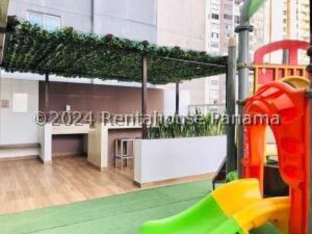 Rooftop swimming pool with panoramic city skyline view PH Coral Tower Panama City