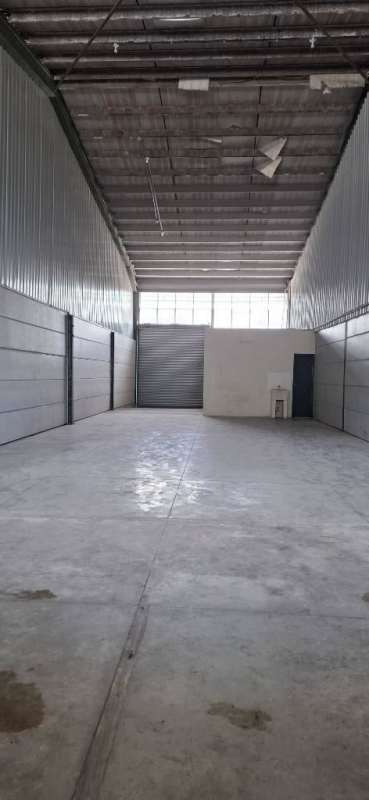 Interior view of empty industrial warehouse with metal ceiling Villa Zaita Panama