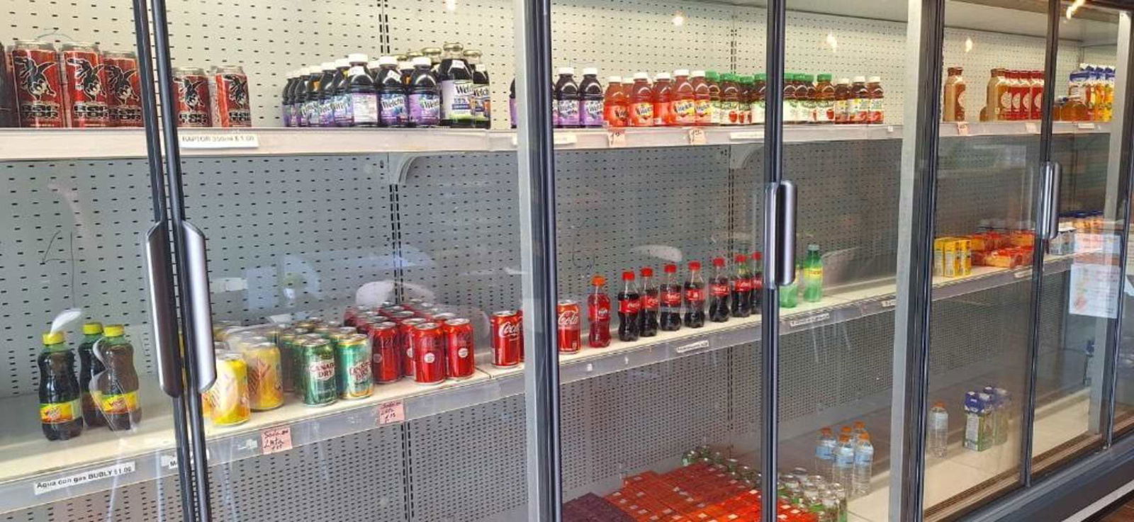 Commercial refrigerator display with products in retail store Chepo Panama