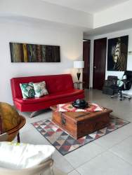 Open plan kitchen with granite countertops, appliances in PH Mosaic Panama Pacifico