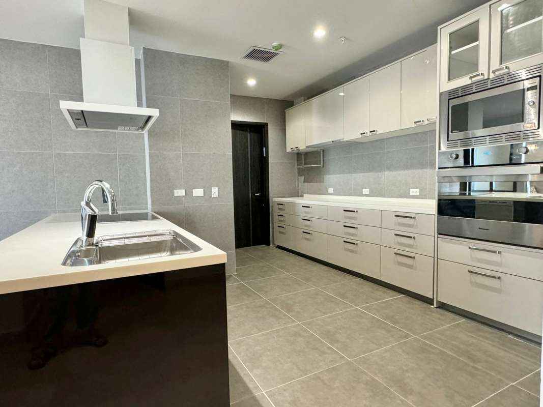 Master bedroom with large windows, walk-in closet, ocean views at PH Grand Tower