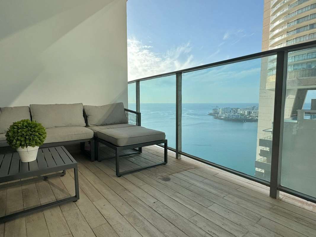 Luxury kitchen with granite island, high-end appliances at Grand Tower Panama