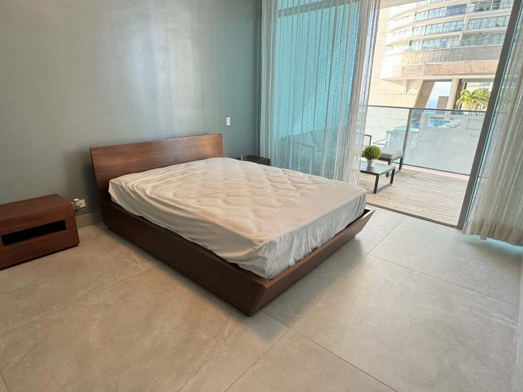 Elegant bathroom with marble counters, glass showers in PH Grand Tower Punta Pacífica