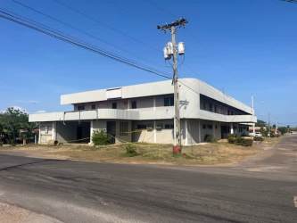 Modern two-story corner building with balconies in Aguadulce Coclé Panama ideal medical use