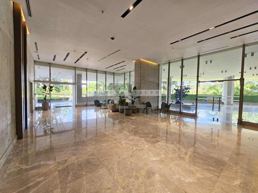 Large bright living area with marble floors, terrace access at PH Greenview Santa Maria Panama