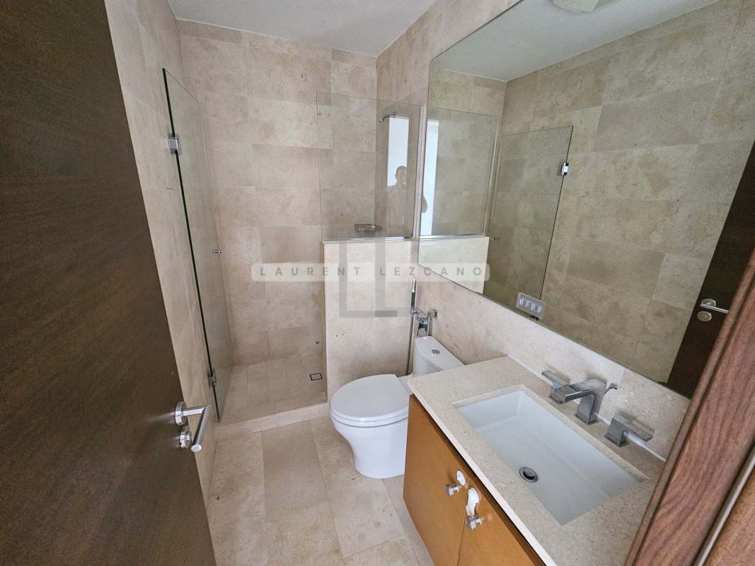 Contemporary kitchen with ample storage, double sink, and tile floors in PH Greenview Santa Maria Panama