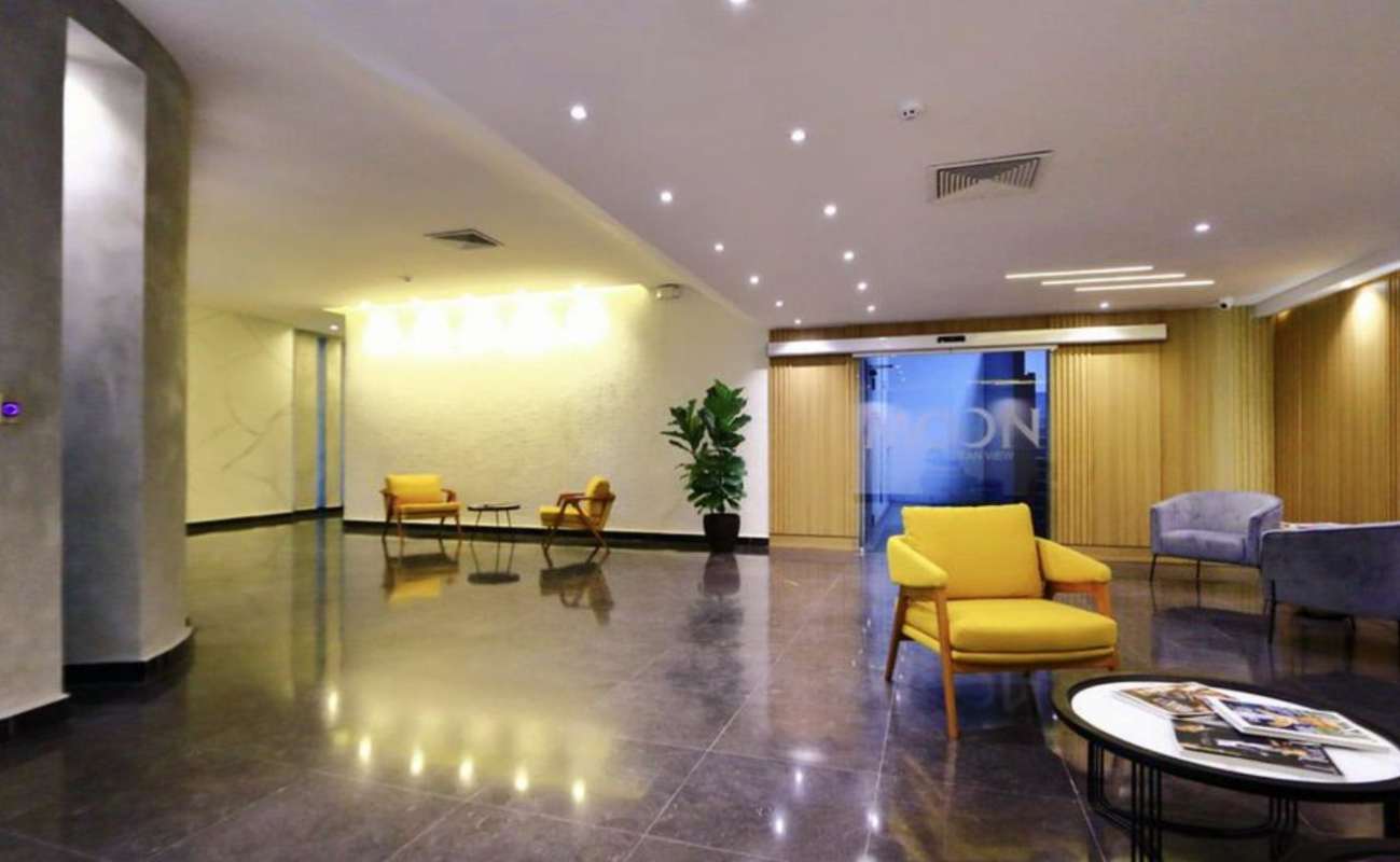 Contemporary kitchen with granite countertops, appliances and stylish cabinetry in PH Coco del Mar