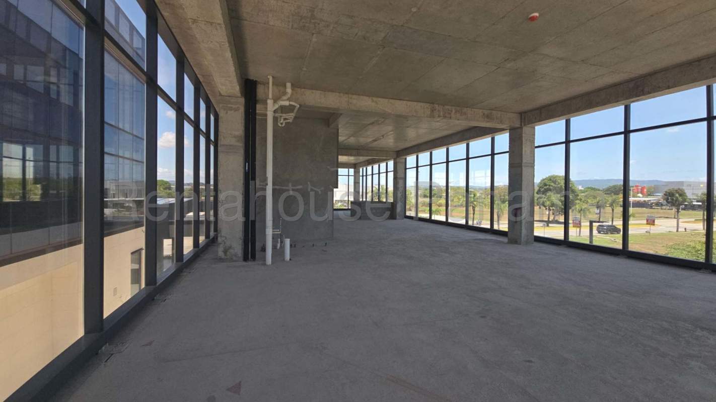 Spacious rooftop terrace with glass railings city skyline views at boutique corporate building in Santa Maria Panama
