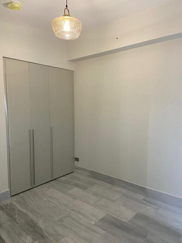 Elegant rooftop lounge with panoramic skyline views and luxury seating in PH Nuovo Residences Panama