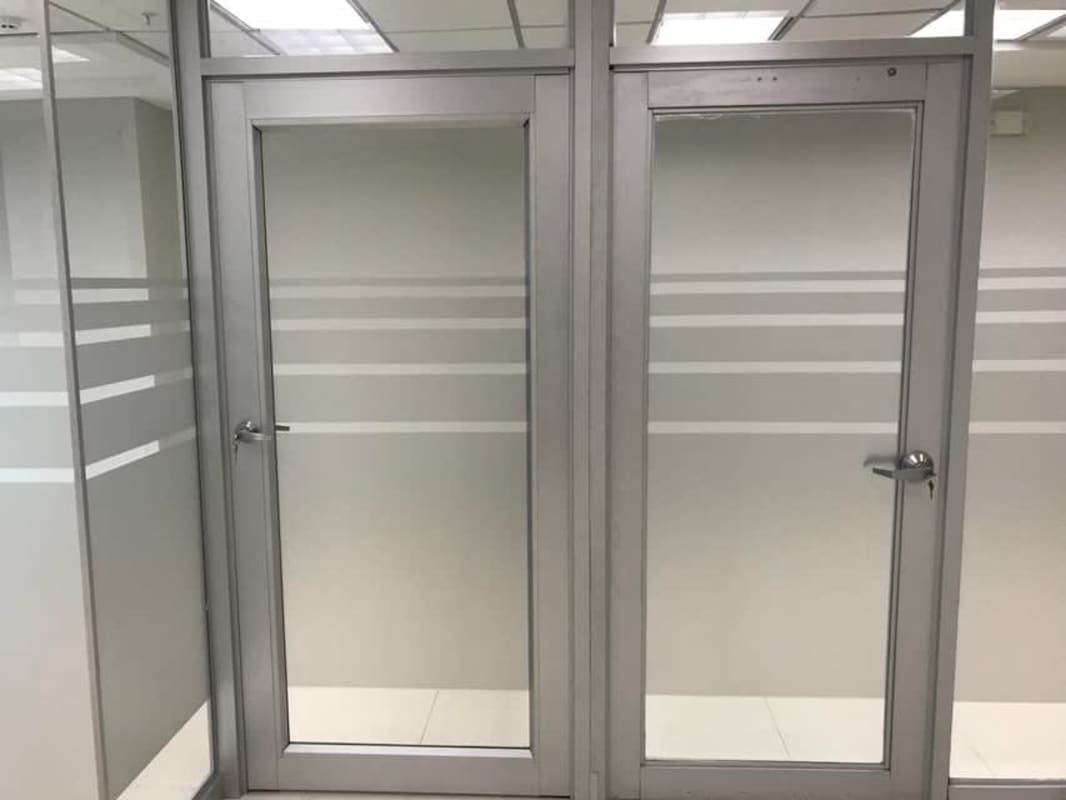 Conference room with glass partitions in prime office tower in Panama
