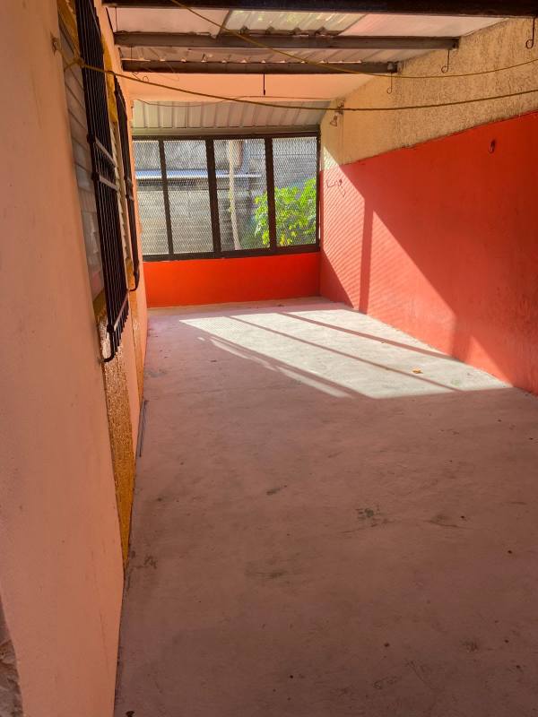 Covered outdoor patio or carport area in PH Parque Lefevre Panama