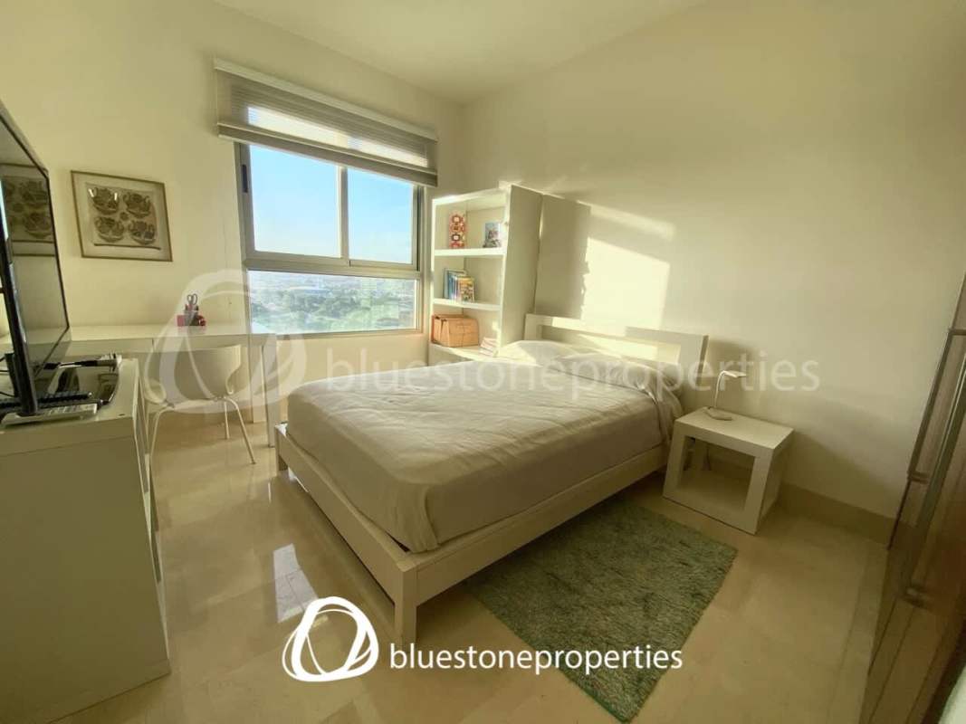 Gourmet kitchen with granite counters and stainless appliances in PH Greenview Residences Panama