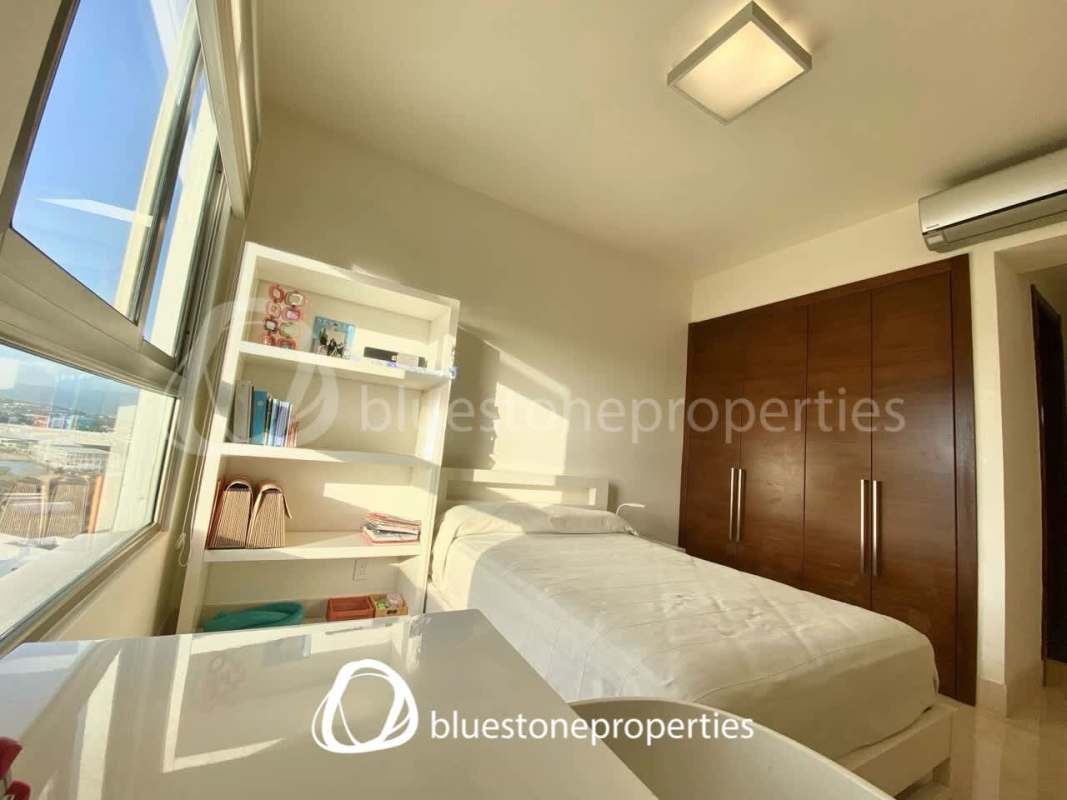 Master bedroom featuring large windows and panoramic golf views in PH Greenview Santa Maria