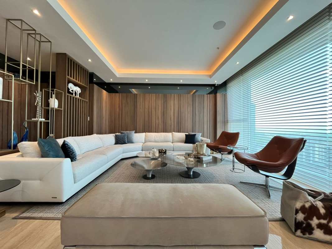 Contemporary luxury dining area with built-in cabinetry and marble countertops in PH Solana Santa Maria