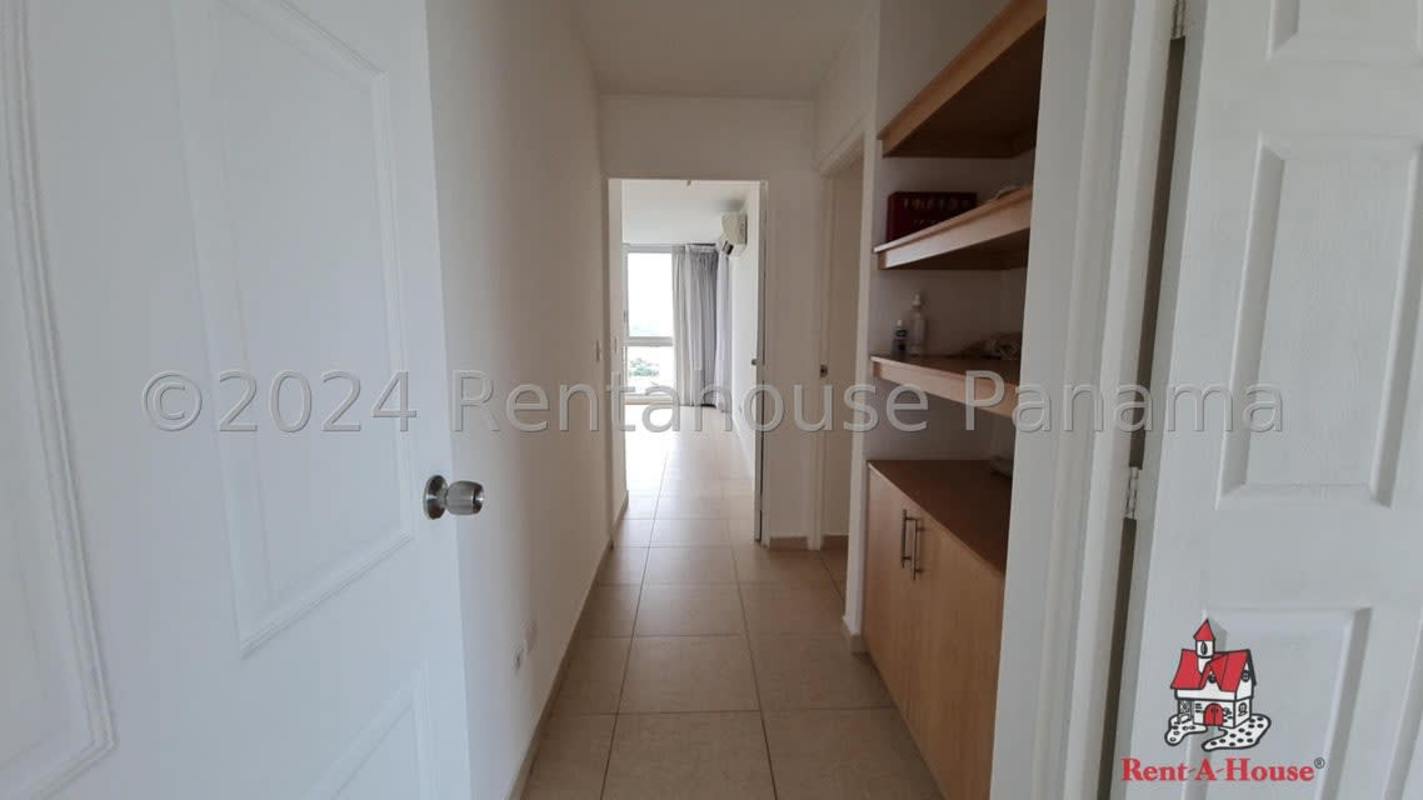 Secondary bedroom built-in closet ceramic floors city views Costa del Este Panama condo