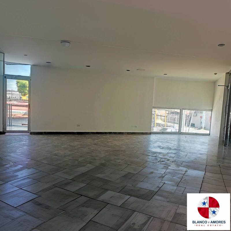 Large unfurnished commercial space with big windows, tile floors and modern lights in Costa Sur Panama