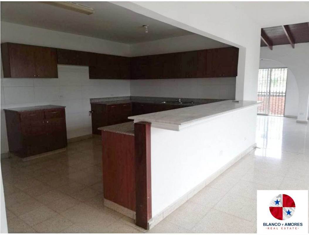 Covered porch with columns and gated parking in rental house El Dorado Panama