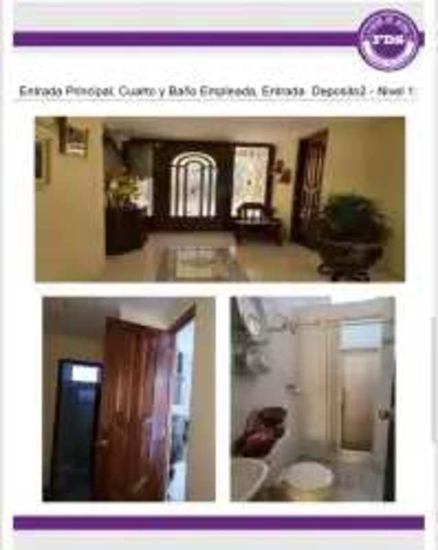 Street view of house facade with gated entry and parking Villa de las Fuentes Panama City