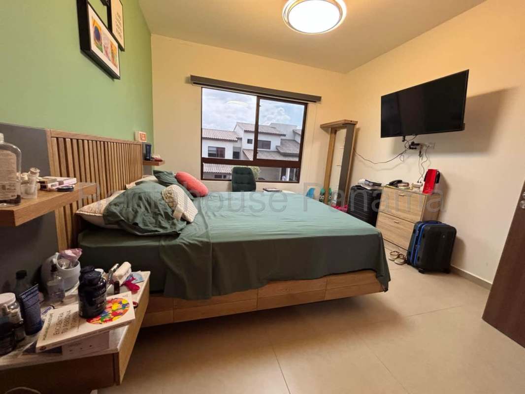 Spacious master bedroom with built-in closet and balcony Golf Gardens house Panama City