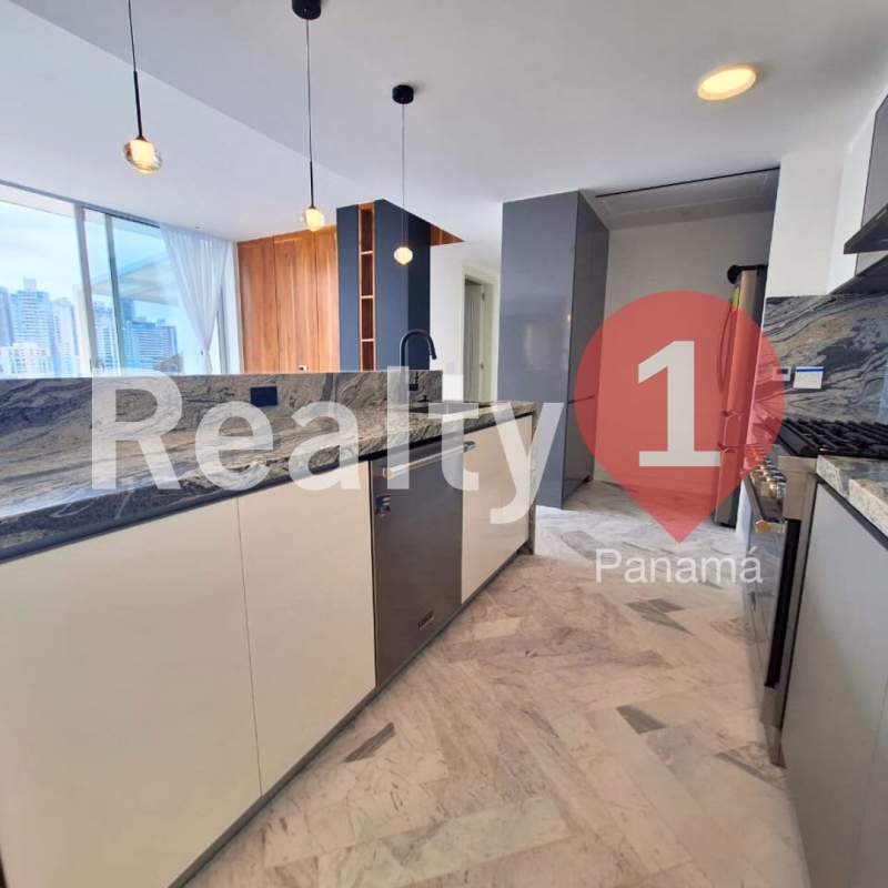 Modern kitchen with marble counters city skyline views, built-in appliances PH Wanders & Yoo Panama