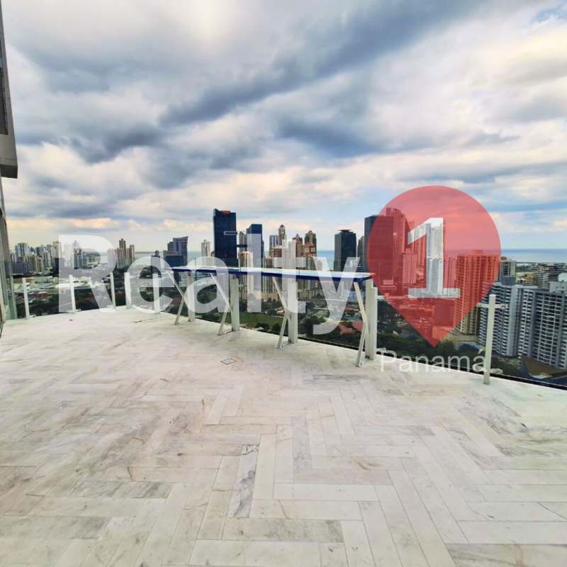 Expansive terrace with panoramic skyline and ocean views, glass railing at PH Wanders & Yoo Panama
