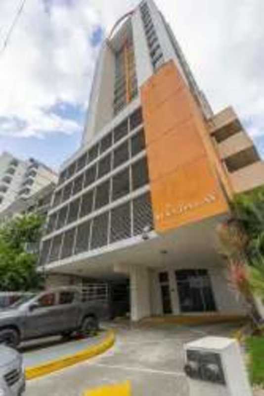 Modern high-rise condo with orange facade and parking in PH Mandalay El Cangrejo