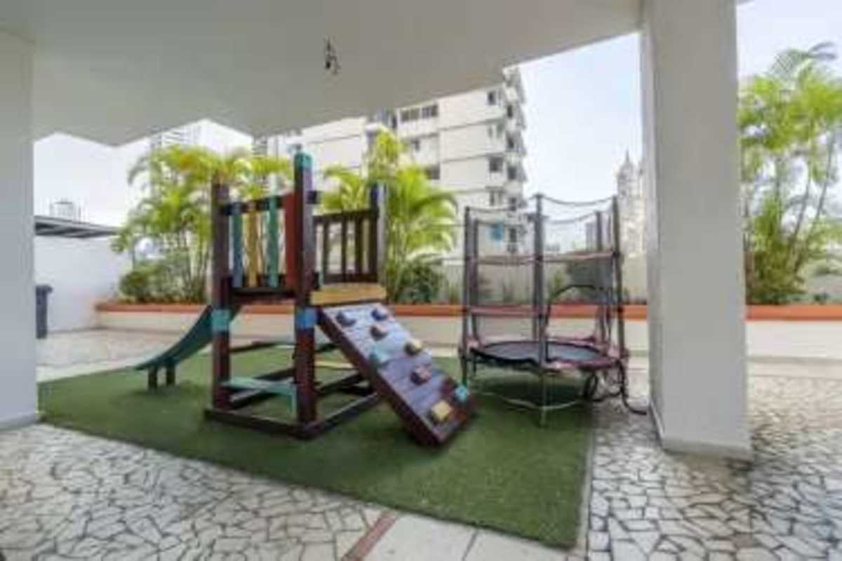 Covered kids playground with trampoline, slide at PH Mandalay apartment Panama