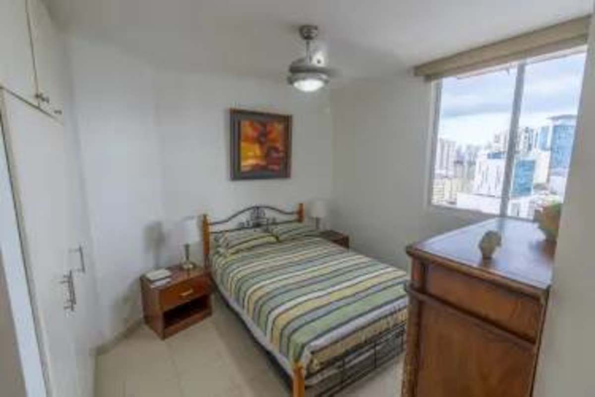 Second bedroom bright window, closet, tile floors PH Mandalay El Cangrejo Panama