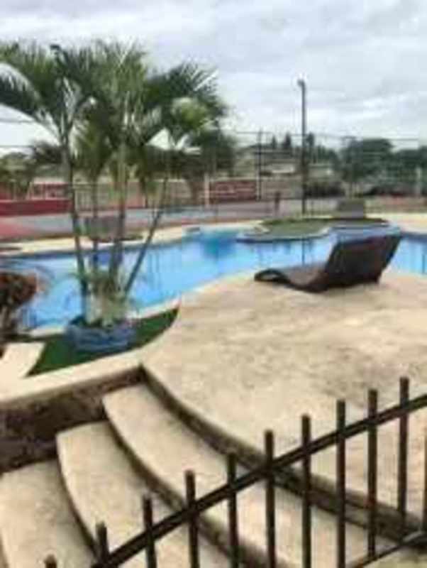 Spacious covered patio with ceiling fans, seating, garden view at Gold Springs Condado del Rey Panama