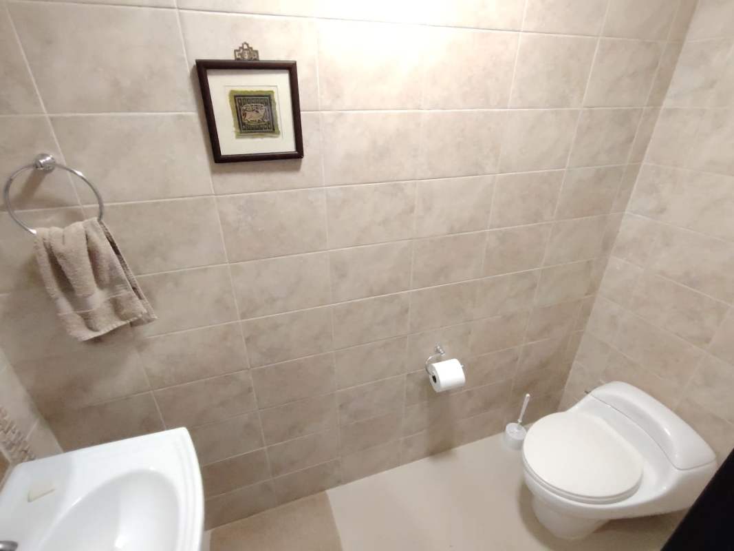 Bright master bedroom with large windows and walk-in closet in PH Pine Hill Panama