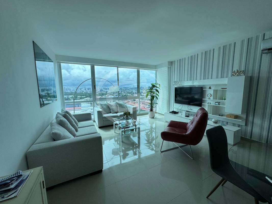 Open living area in PH Top Tower with ceiling windows city skyline Costa del Este Panama