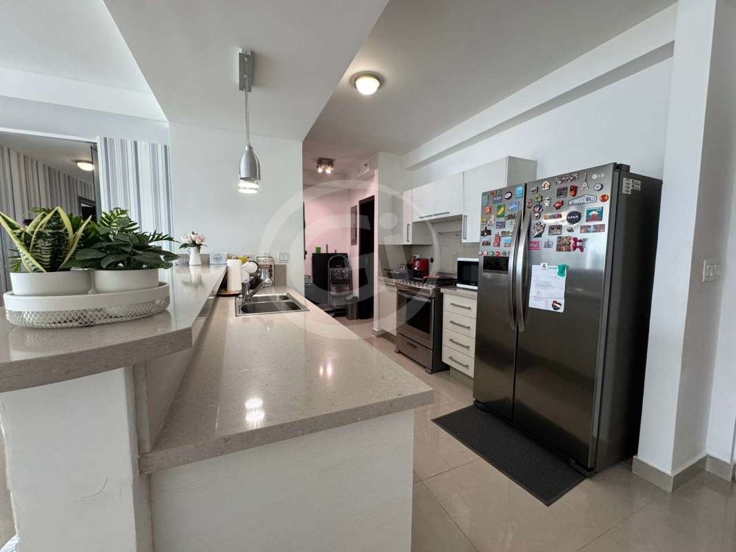 Modern bathroom with double vanity and glass shower in PH Top Tower Panama City
