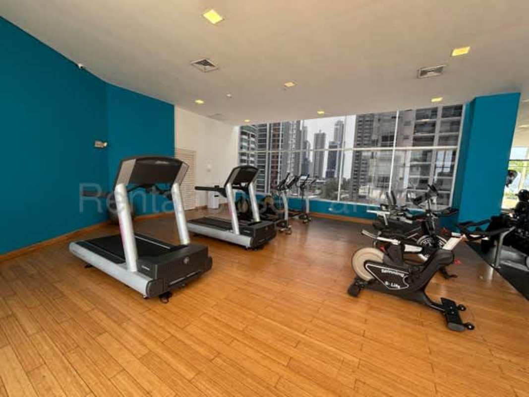 Infinity swimming pool and jacuzzi on terrace with city and ocean views